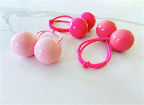 pink hair ties with balls